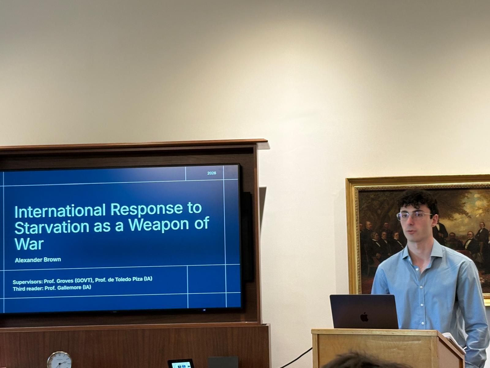 Alexander Brown defends his honors thesis